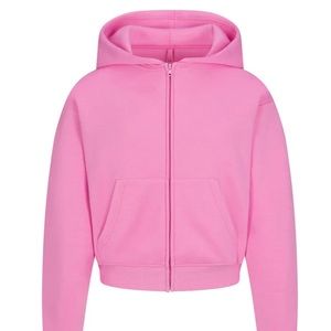 Skims bubblegum pink cotton fleece zip up and cotton fleece jogger set.